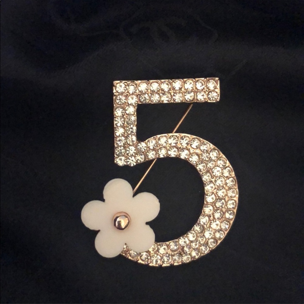 Crystal studded No.5 brooch with Camelia flower